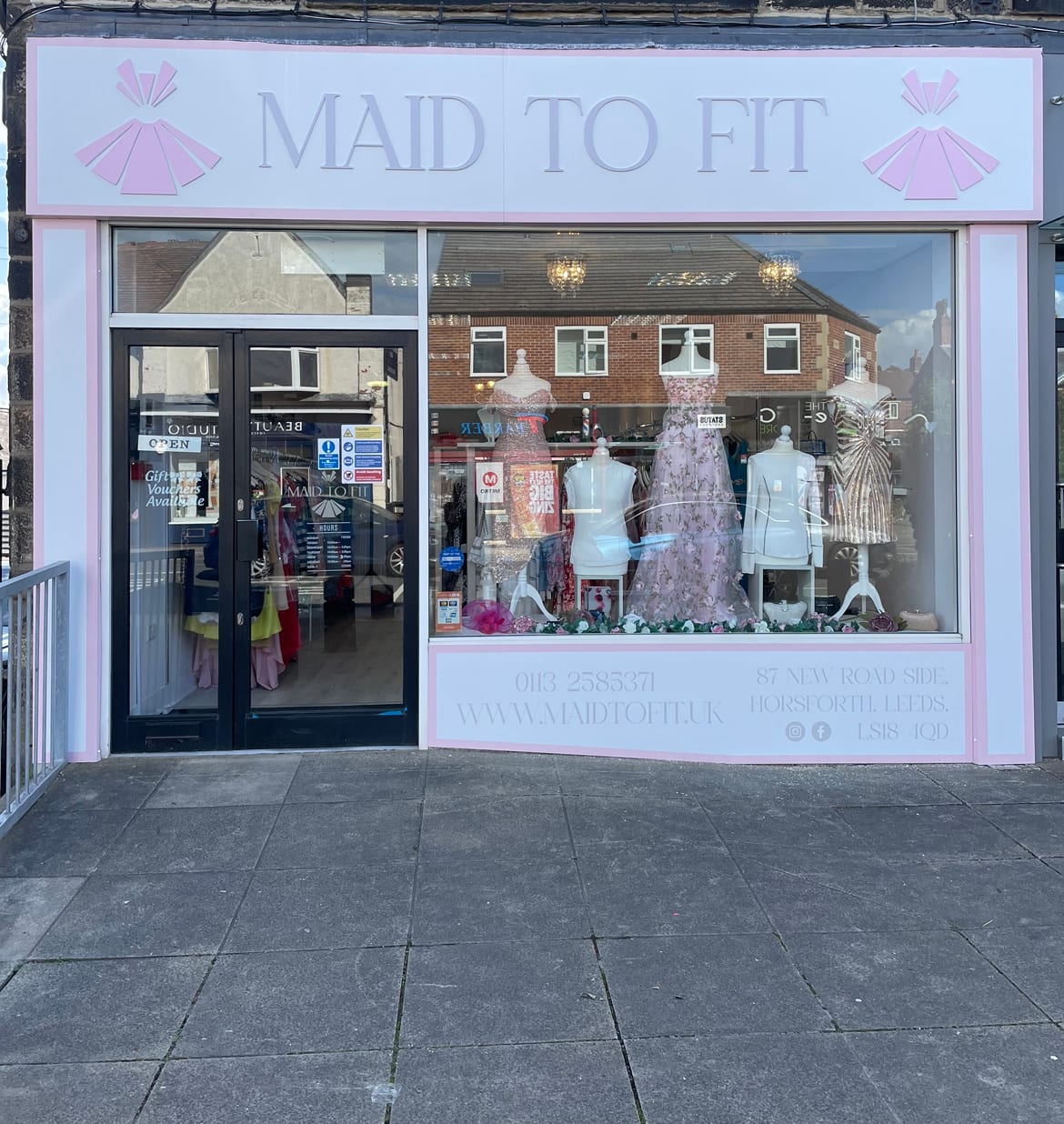 The pink Maid To Fit shopfront at 87 New Road Side in Horsforth